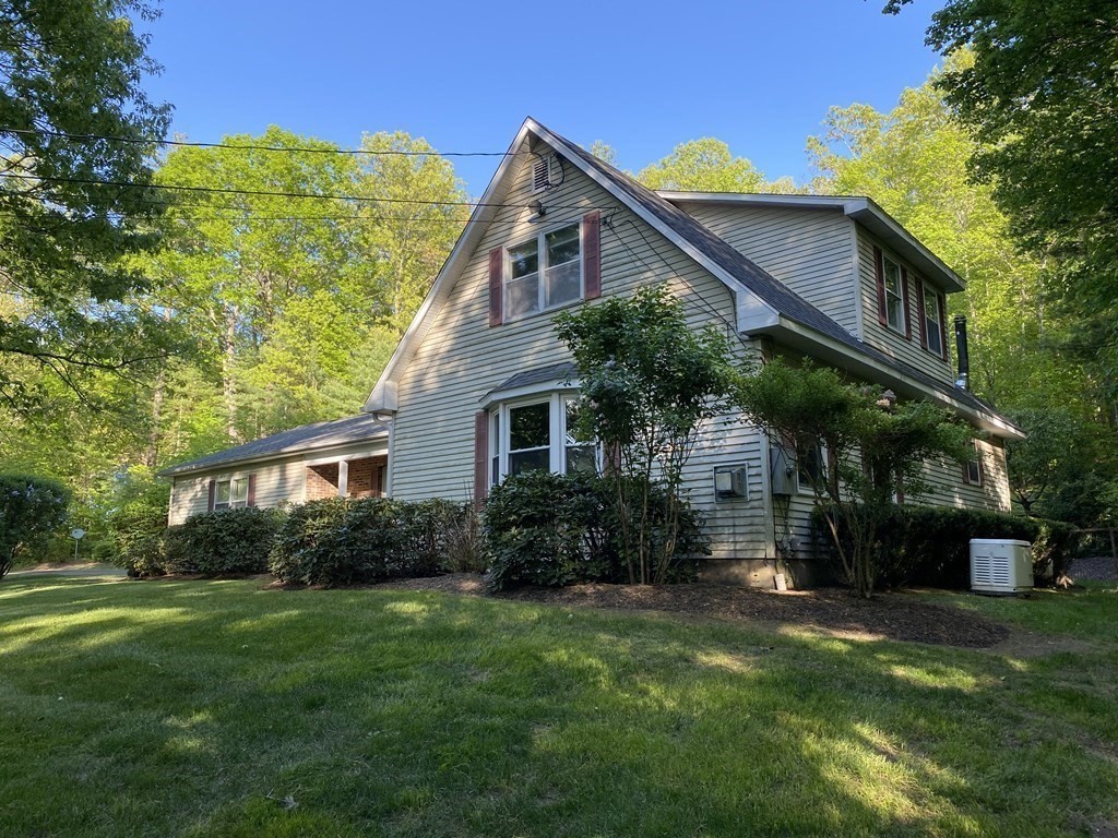 76 Main Road Gill, MA 01354 - Photo 4 of 36 a front view of house with yard and green space