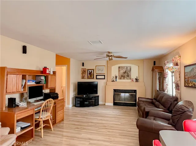 a kitchen with stainless steel appliances granite countertop a sink and a refrigerator