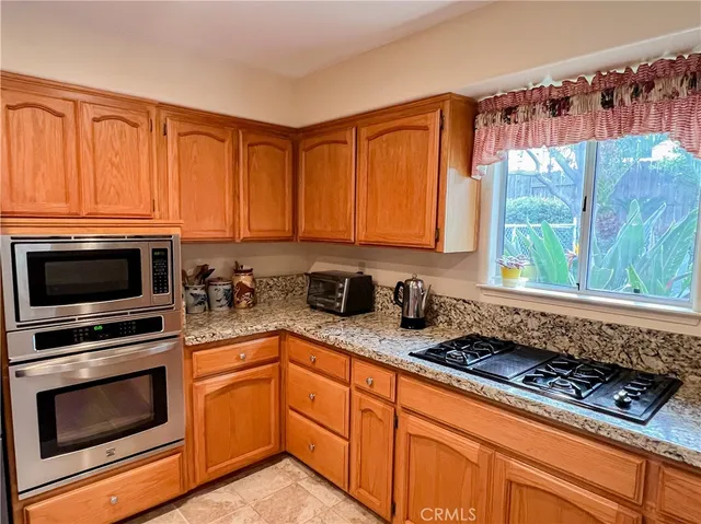 a close view of a sink and dishwasher