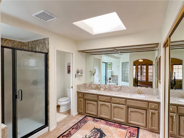 a view of living room with furniture and large window
