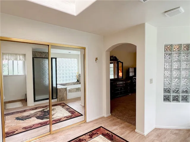 a view of a backyard with large trees