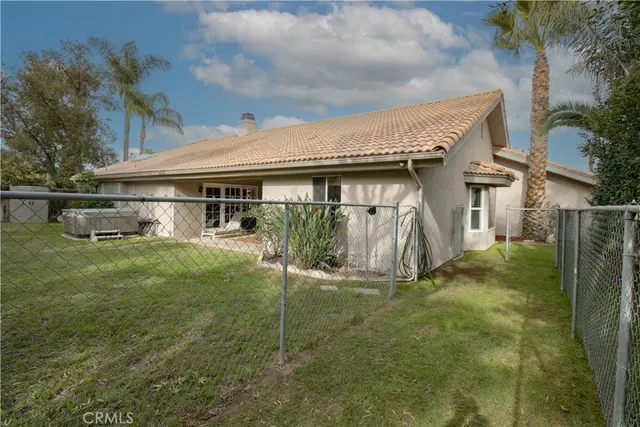 an aerial view of residential house with outdoor space