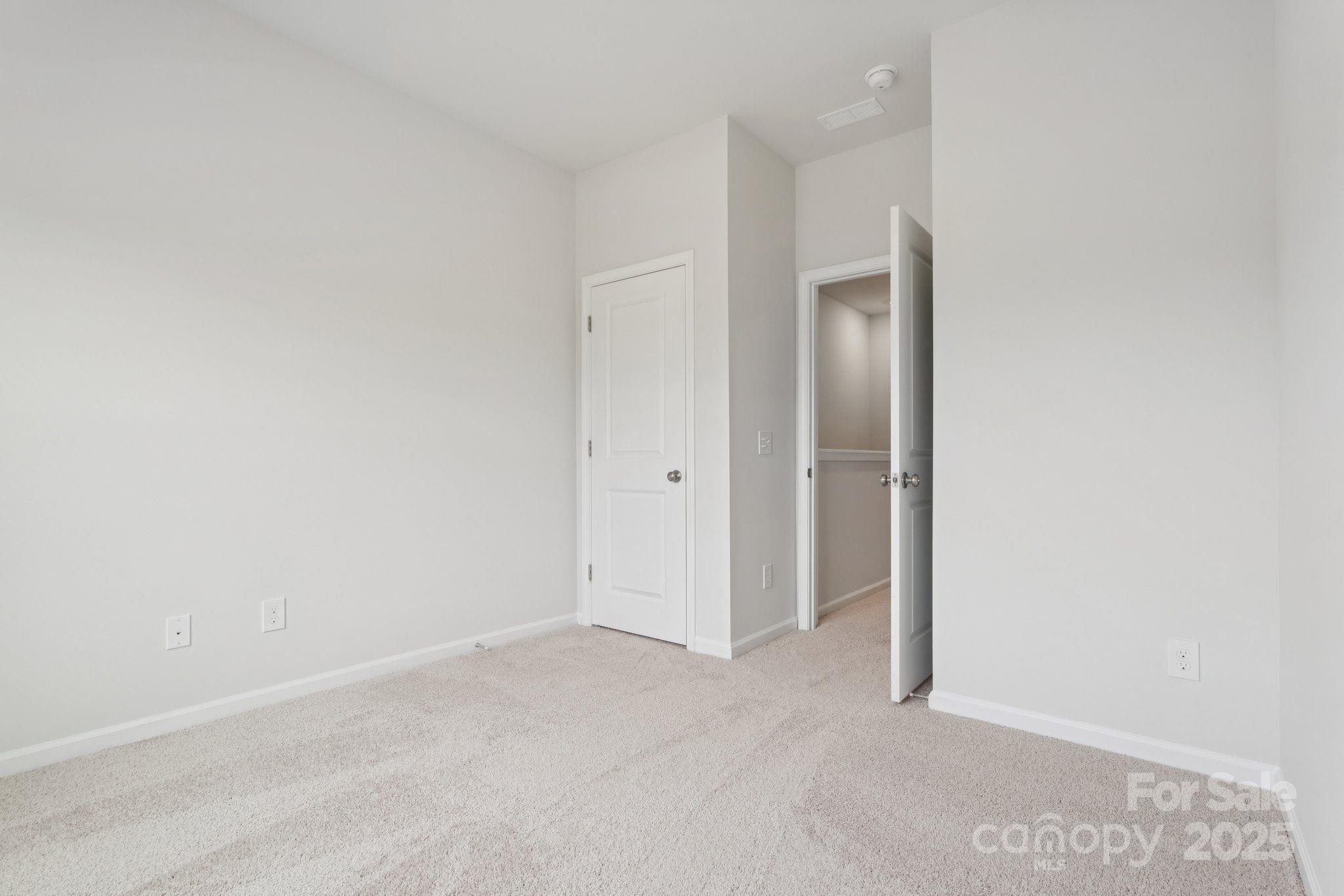 4742 Lakeview Road, Unit 17 Charlotte, NC 28216 - Photo 23 of 27 a view of an empty room