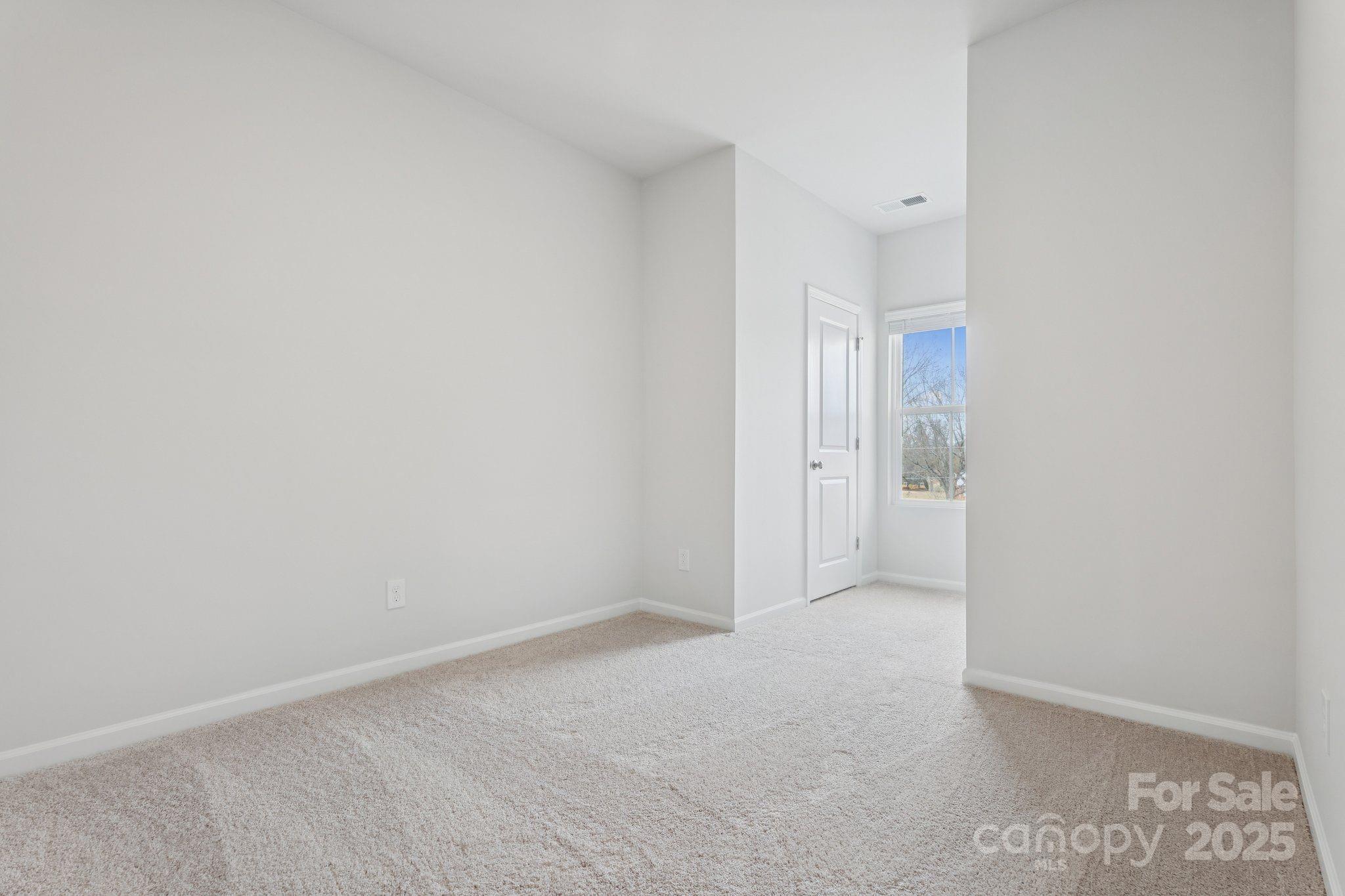 4742 Lakeview Road, Unit 17 Charlotte, NC 28216 - Photo 24 of 27 a view of an empty room