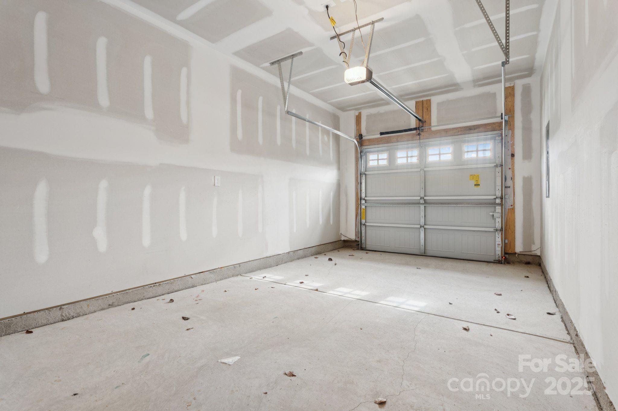 4742 Lakeview Road, Unit 17 Charlotte, NC 28216 - Photo 25 of 27 a view of a room with garage