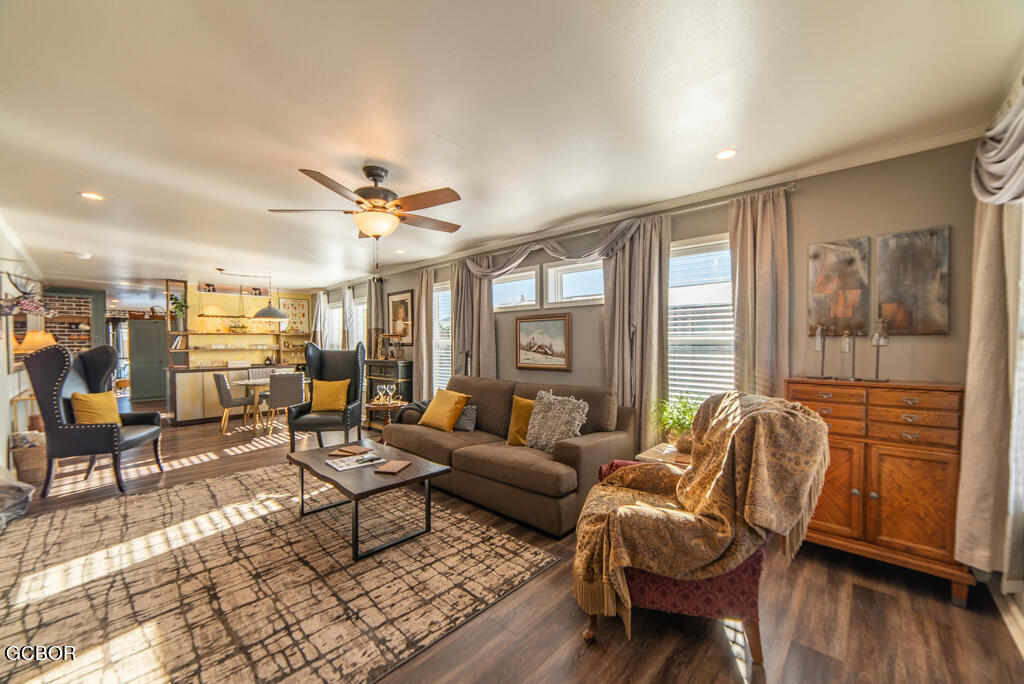 551 Summit Trail, Unit 199 Granby, CO 80446 - Photo 18 of 34 a living room with furniture and wooden floor