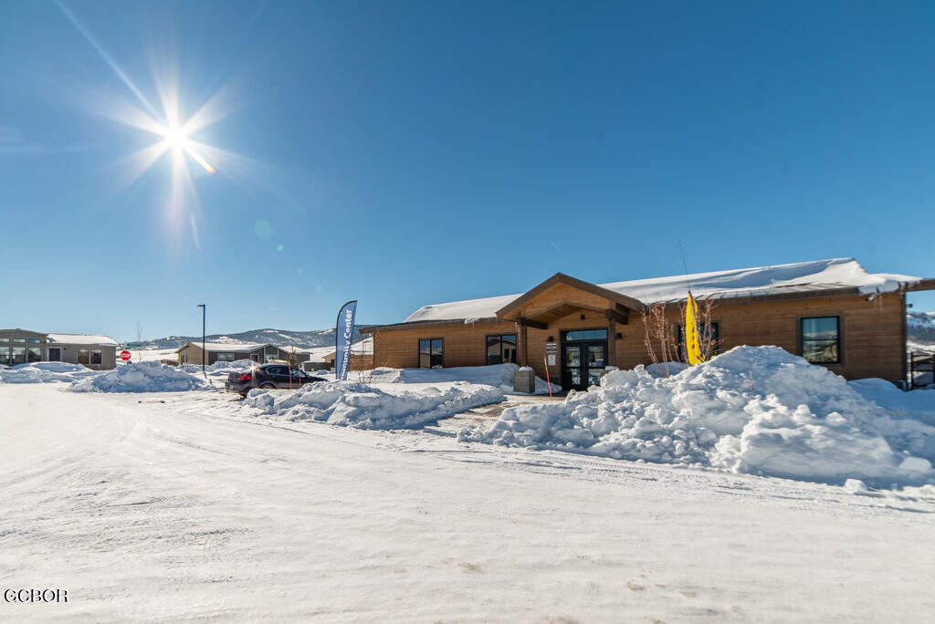 551 Summit Trail, Unit 199 Granby, CO 80446 - Photo 28 of 34 a view of a house with a snow in the background