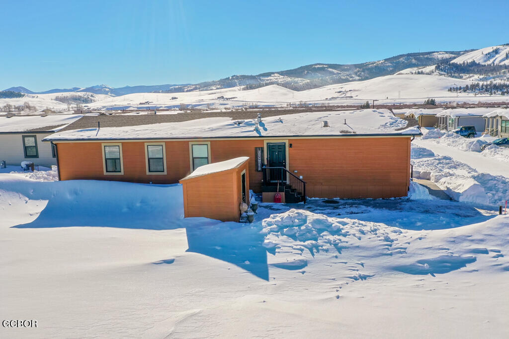 551 Summit Trail, Unit 199 Granby, CO 80446 - Photo 31 of 34 a view of a room with wooden floor