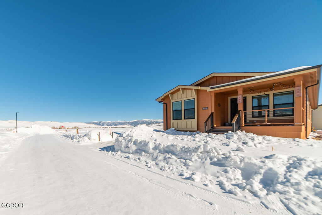 551 Summit Trail, Unit 199 Granby, CO 80446 - Photo 33 of 34 a front view of a house with a yard