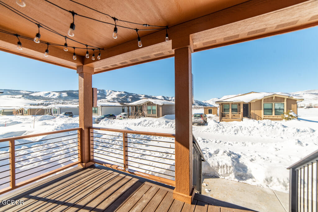 551 Summit Trail, Unit 199 Granby, CO 80446 - Photo 9 of 34 a view of a balcony with wooden floor