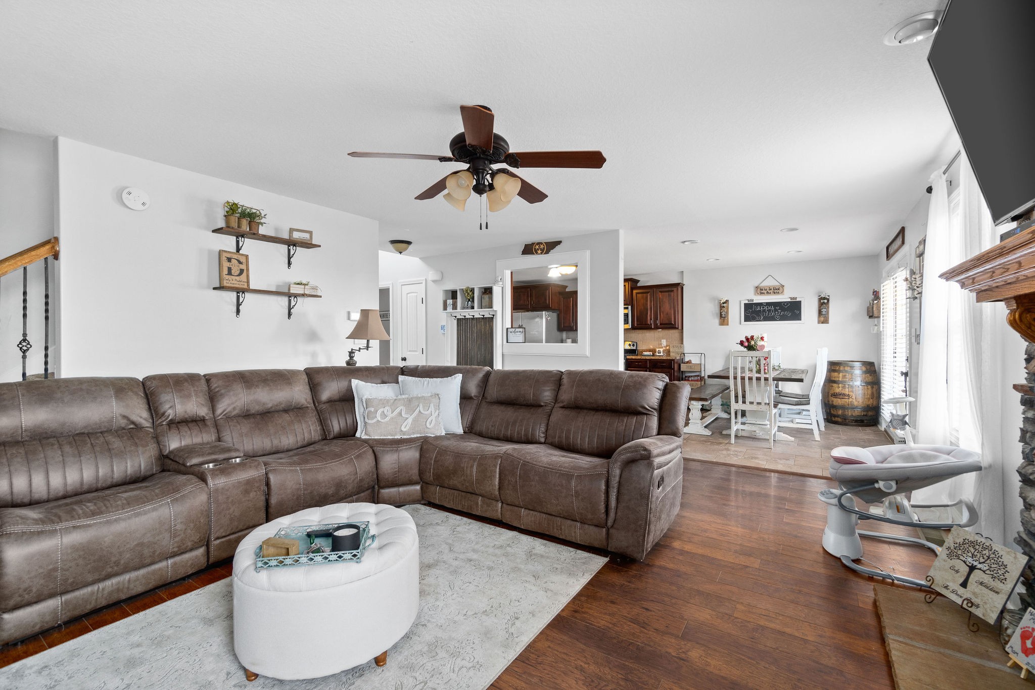 3799 Suiter Road Clarksville, TN 37040 - Photo 8 of 23 a living room with furniture and a flat screen tv