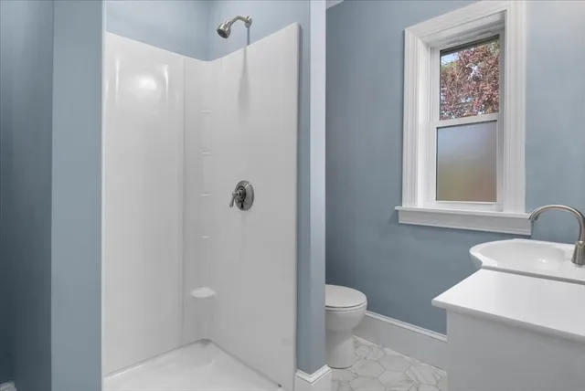 a bathroom with a sink and a toilet