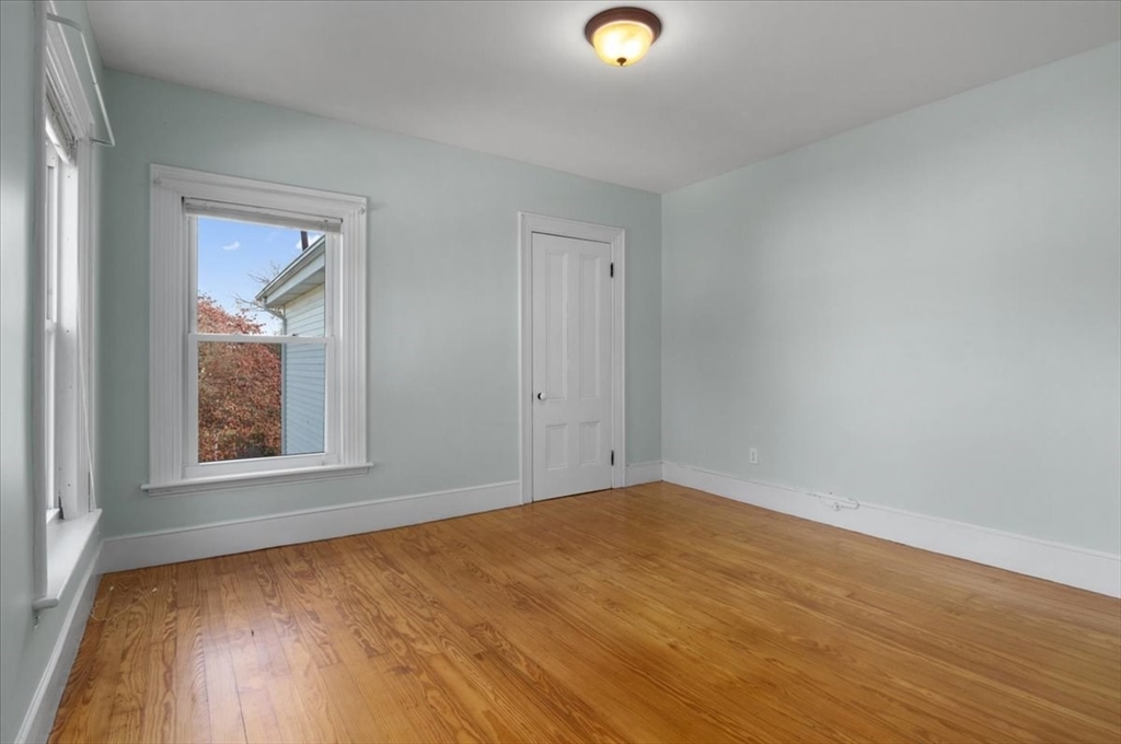 33 Dunbar Street, Unit 33 Canton, MA 02021 - Photo 29 of 42 an empty room with a window
