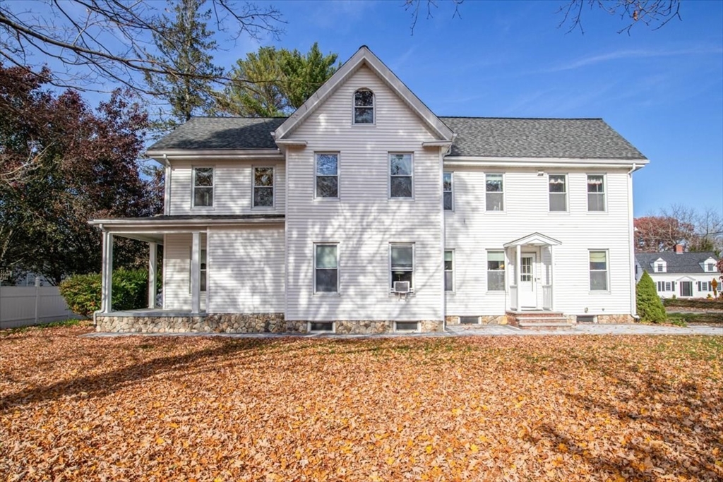 33 Dunbar Street, Unit 33 Canton, MA 02021 - Photo 32 of 42 a front view of a house with a yard