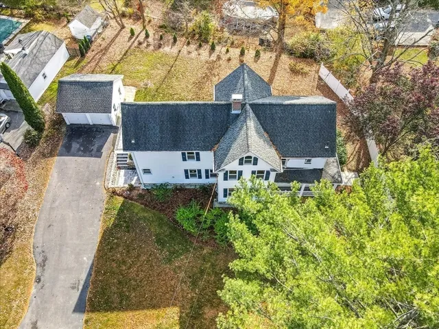 an aerial view of residential house with outdoor space