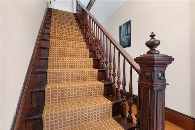 a view of entryway with a front door