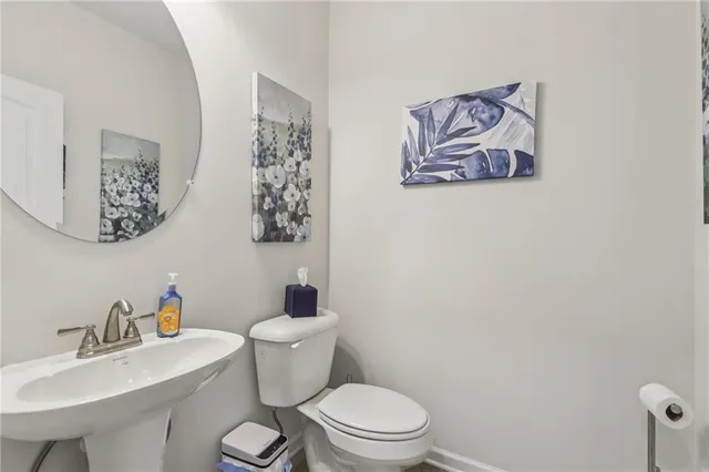 a bedroom with a bed and a television