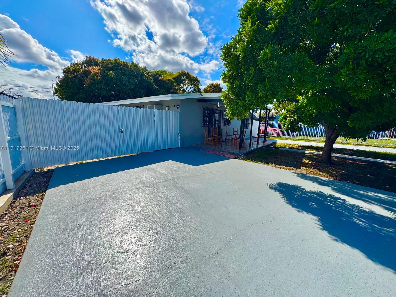 830 Southeast 7th Place Hialeah, FL 33010 - Photo 2 of 19 a view of a backyard