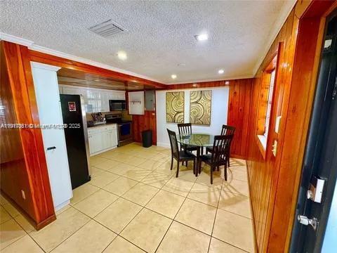 830 Southeast 7th Place Hialeah, FL 33010 - Photo 7 of 19 a view of a dining hall with furniture and a window