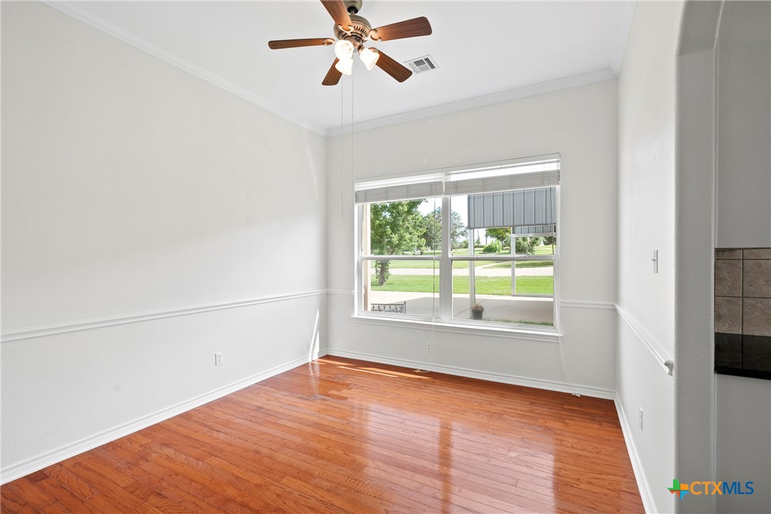 12312 Blackberry Road Salado, TX 76571 - Photo 18 of 46 a view of empty room with wooden floor and fan