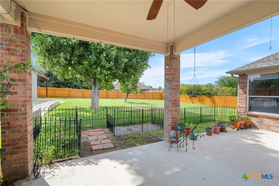 12312 Blackberry Road Salado, TX 76571 - Photo 28 of 46 a view of a table and chairs in patio
