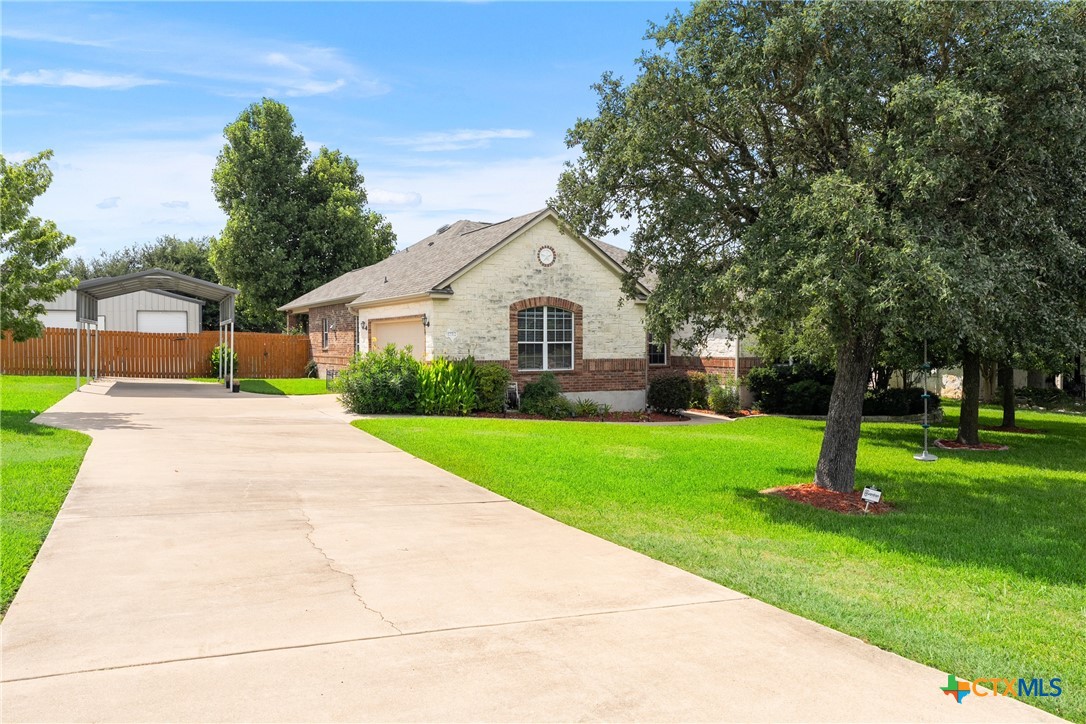 12312 Blackberry Road Salado, TX 76571 - Photo 40 of 46 a front view of a house with a yard and tree