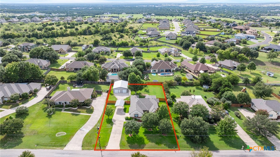 12312 Blackberry Road Salado, TX 76571 - Photo 42 of 46 an aerial view of residential houses with outdoor space and swimming pool