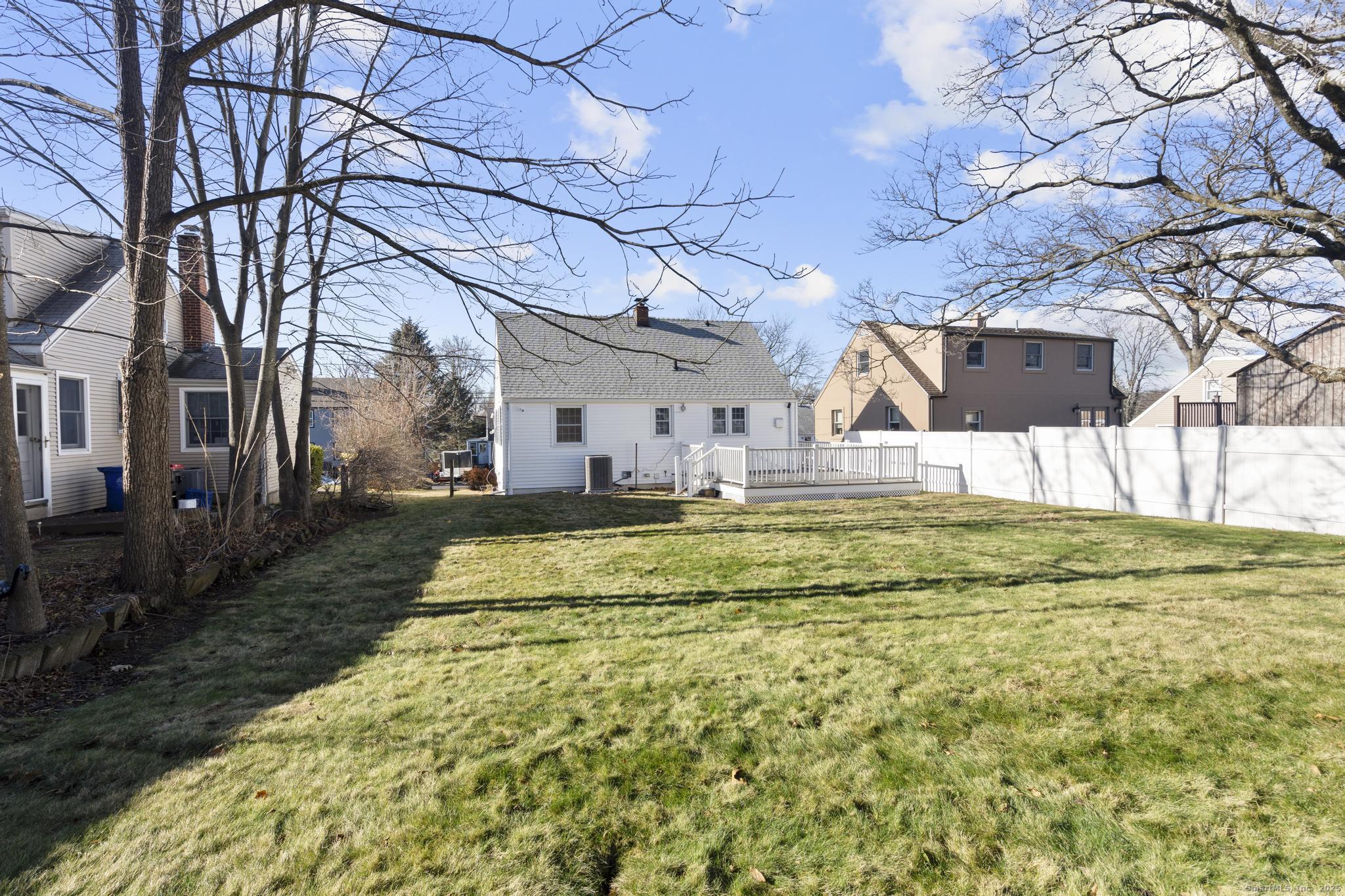16 Silk Street Norwalk, CT 06850 - Photo 21 of 34 a view of a swimming pool with a yard