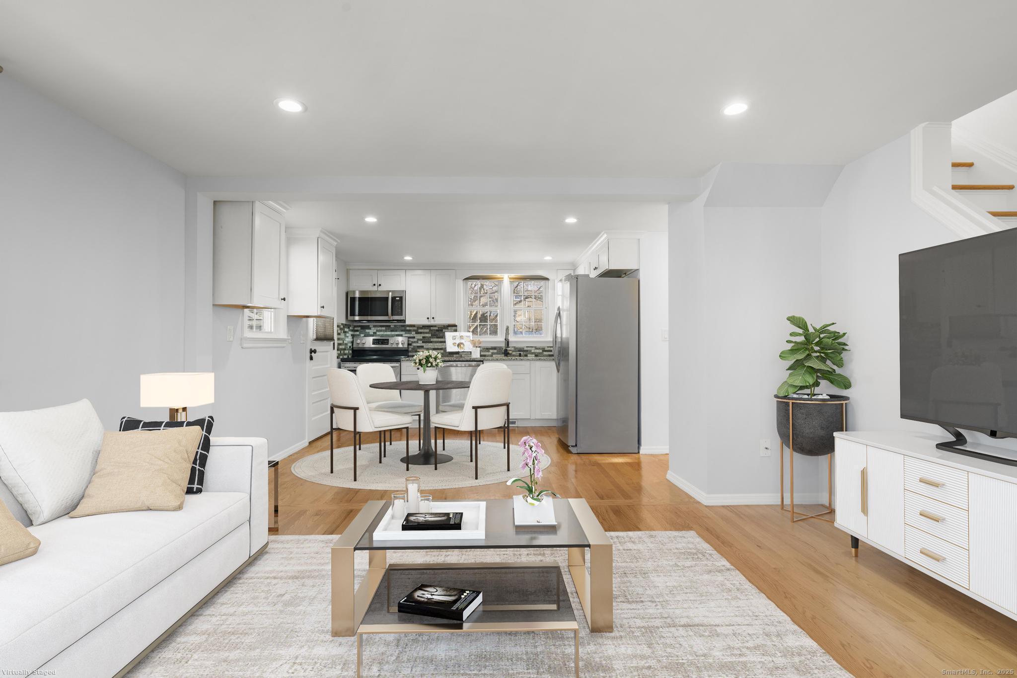 16 Silk Street Norwalk, CT 06850 - Photo 3 of 34 a living room with furniture and a flat screen tv