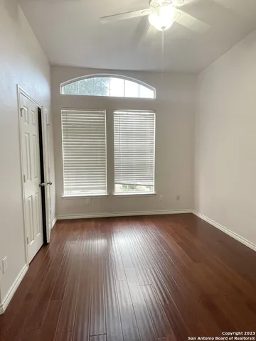 a bathroom with a shower and a toilet