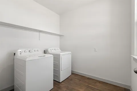 a view of a backyard with grass