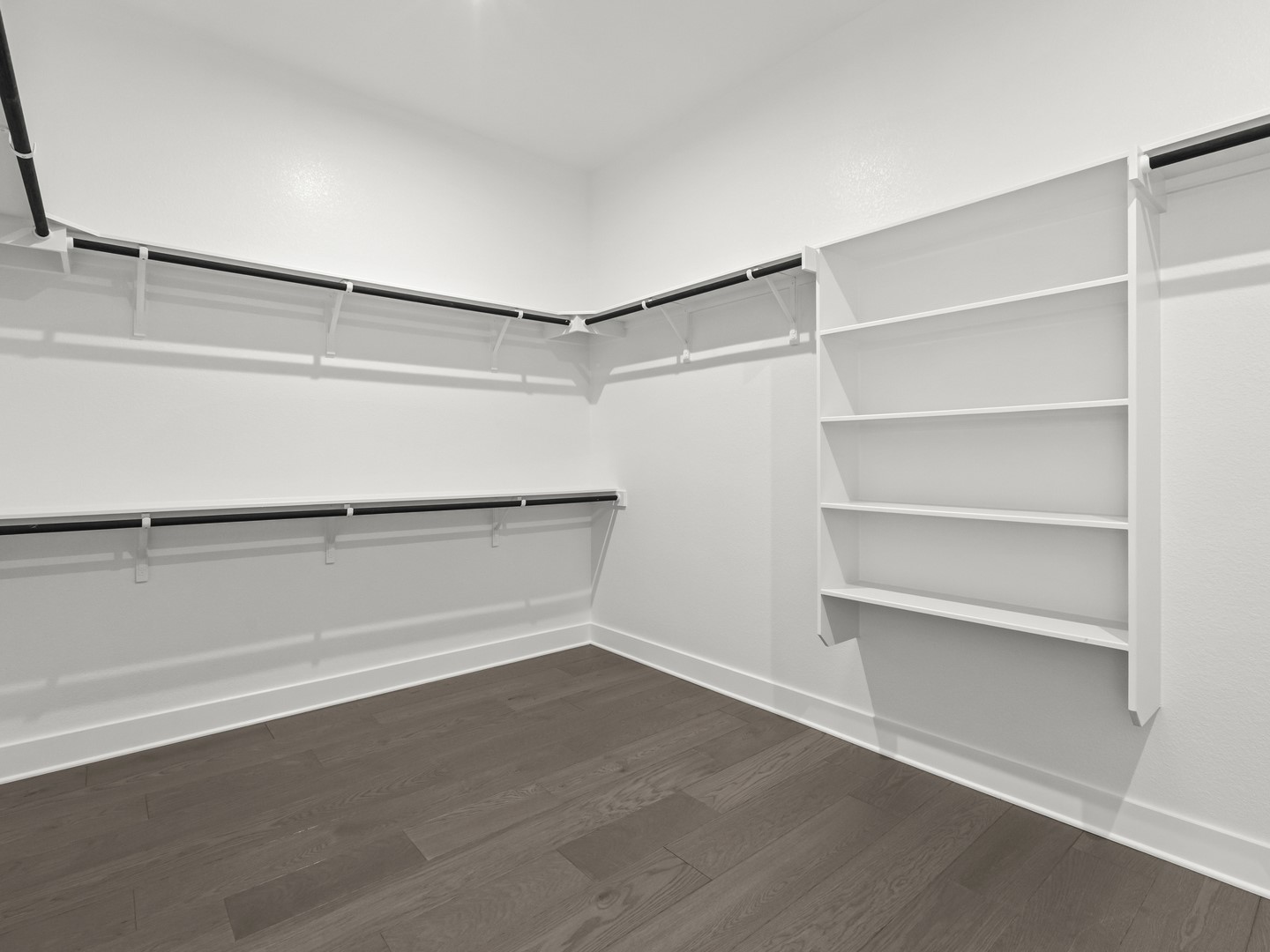 2508 Chiavari Way Leander, TX 78641 - Photo 21 of 24 Ample storage solutions elevate this closet space with integrated shelving and hanging rods.