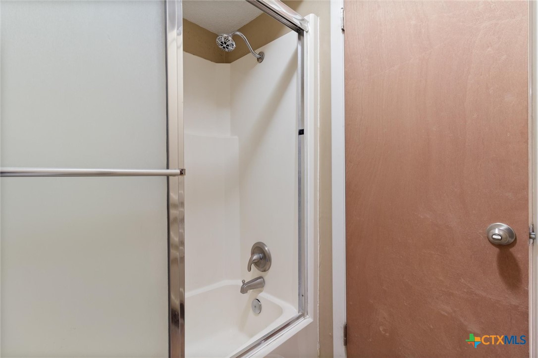 821 Ranch Road 12 San Marcos, TX 78666 - Photo 11 of 30 a bathroom with a bathtub