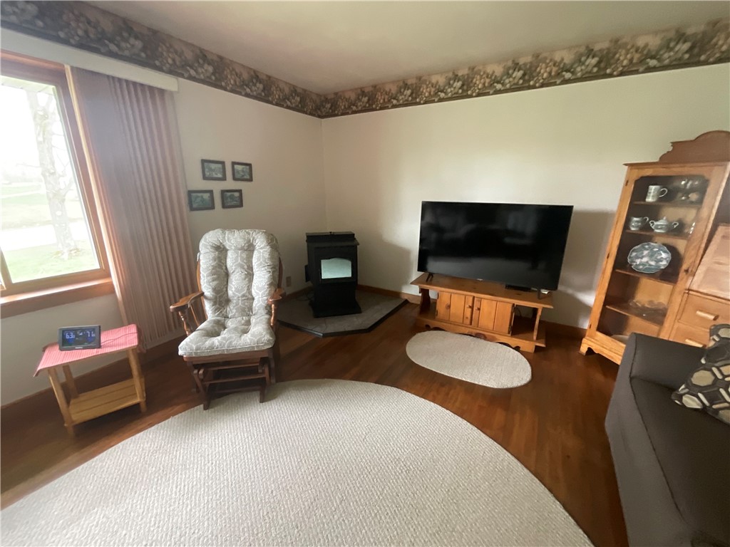 11586 Armison Road Hume, NY 14735 - Photo 9 of 31 Living Room with Pellet Stove
