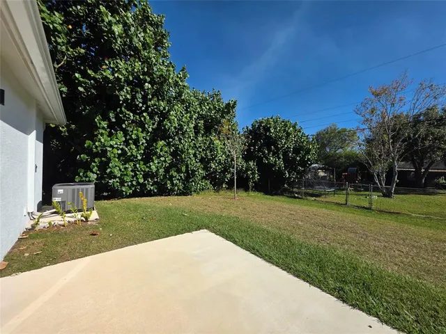 a view of a park with of trees