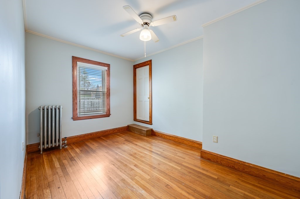 44 Jasper Street Saugus, MA 01906 - Photo 21 of 32 wooden floor in an empty room with a window