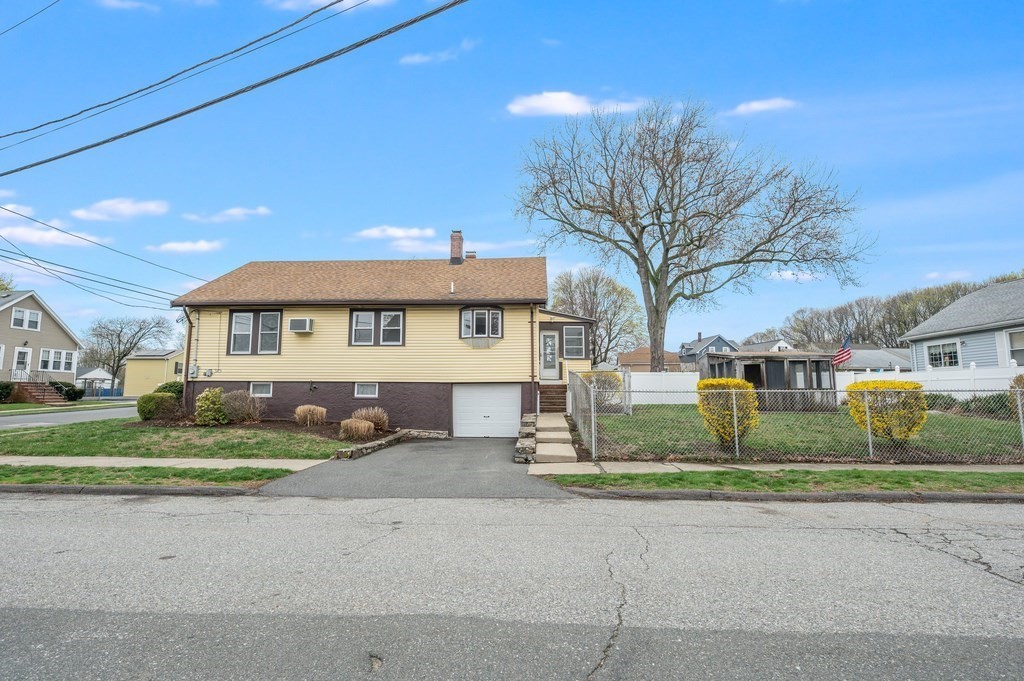 44 Jasper Street Saugus, MA 01906 - Photo 28 of 32 a view of house with a yard