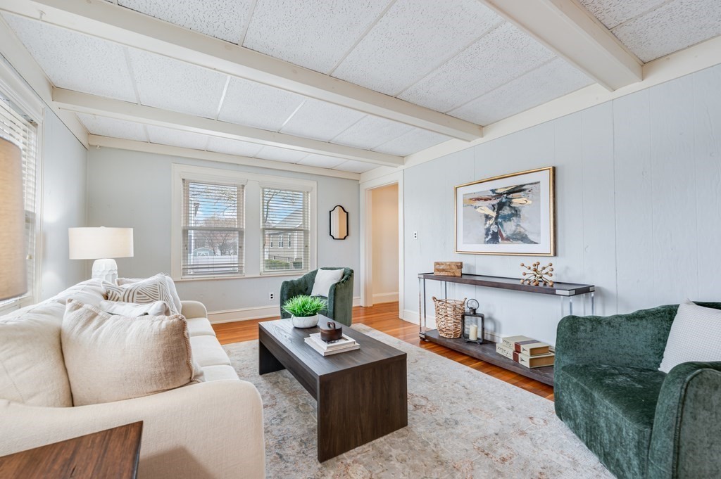 44 Jasper Street Saugus, MA 01906 - Photo 7 of 32 a living room with furniture and a table