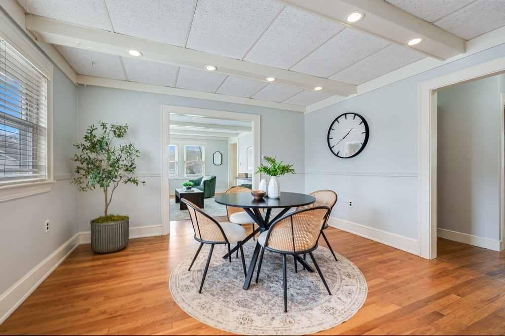 44 Jasper Street Saugus, MA 01906 - Photo 9 of 32 a view of a dining room with furniture and wooden floor