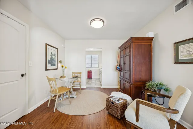 a kitchen with stainless steel appliances a stove a microwave and a refrigerator