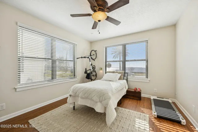 an aerial view of residential house with outdoor space and parking