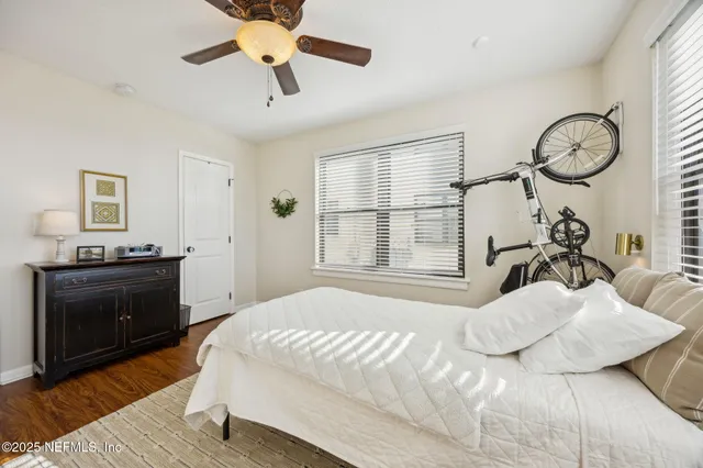 a view of a house with backyard and porch