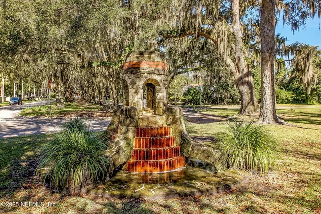 a view of outdoor space with deck and trees