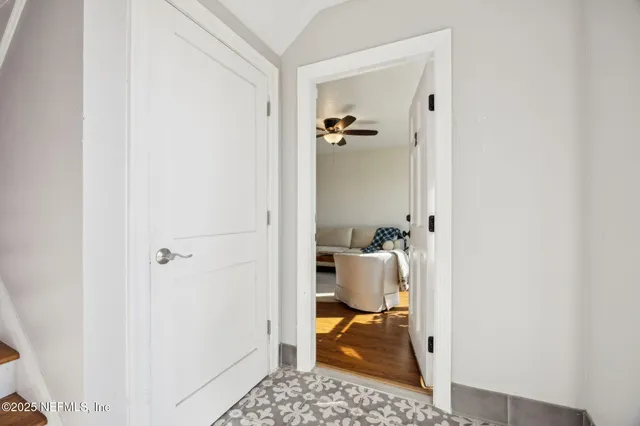 a kitchen with stainless steel appliances a stove a microwave and a refrigerator