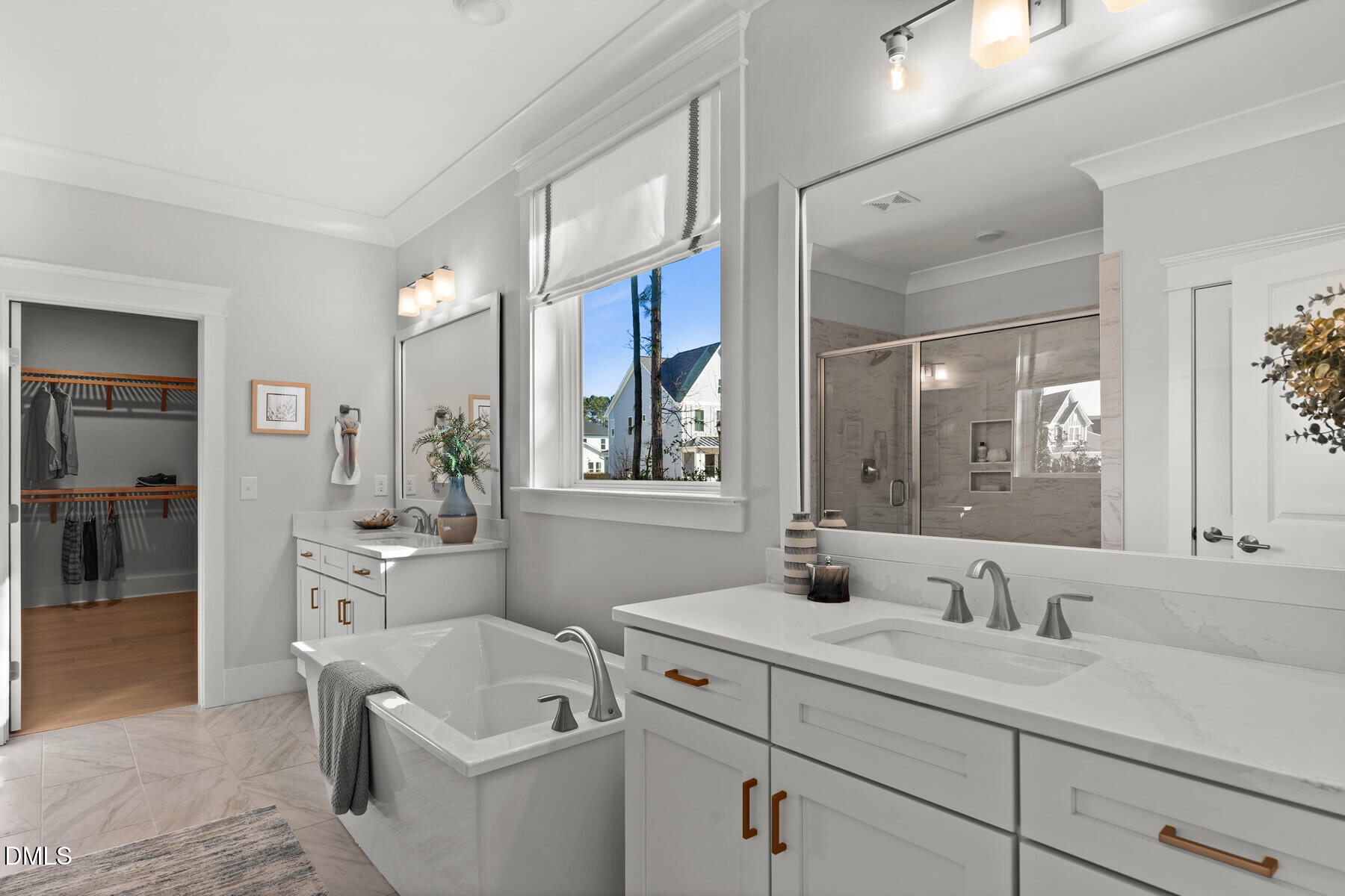 8116 Andrea Lane, Unit 101 Raleigh, NC 27613 - Photo 11 of 17 a bathroom with a sink and a mirror