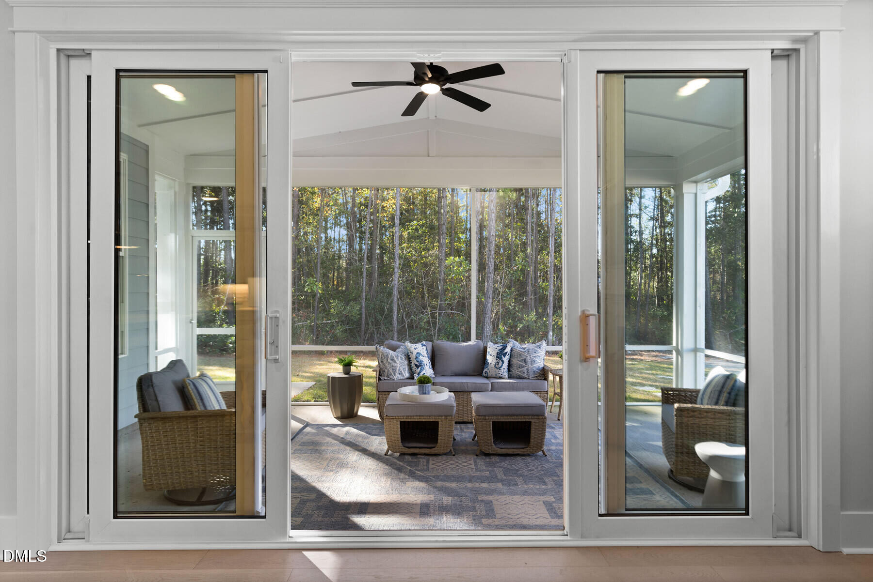 8116 Andrea Lane, Unit 101 Raleigh, NC 27613 - Photo 5 of 17 a living room with furniture and a floor to ceiling window