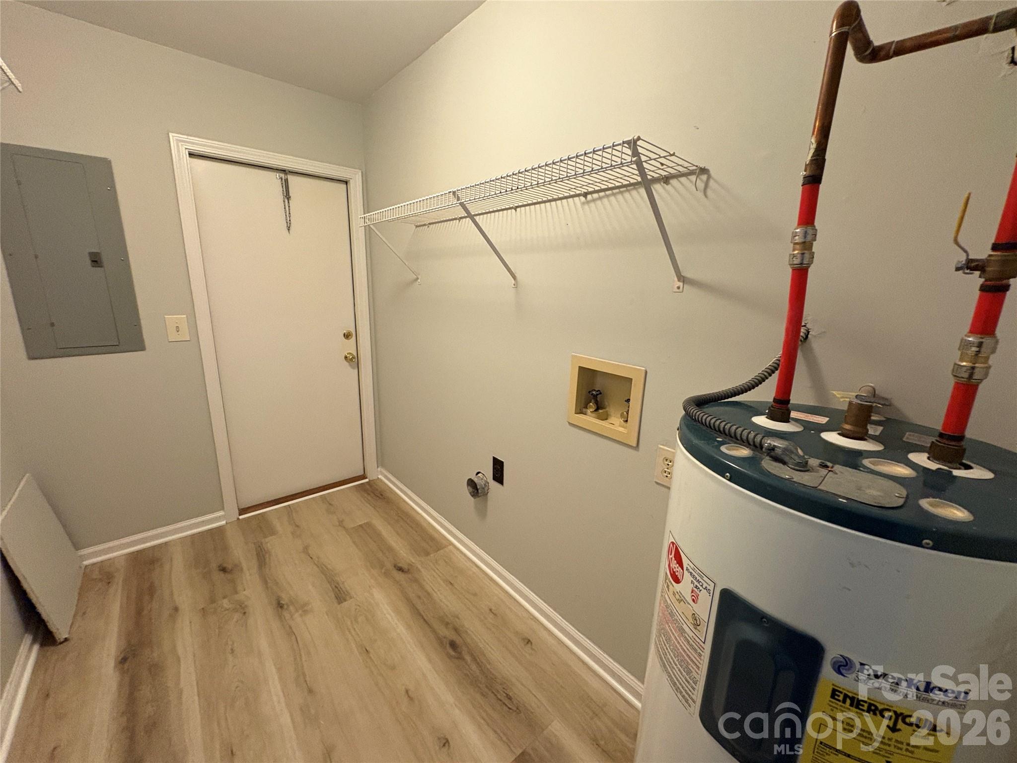 6725 Bevington Ridge Road, Unit A/B Charlotte, NC 28277 - Photo 38 of 48 a bathroom with a sink and mirror with bathtub