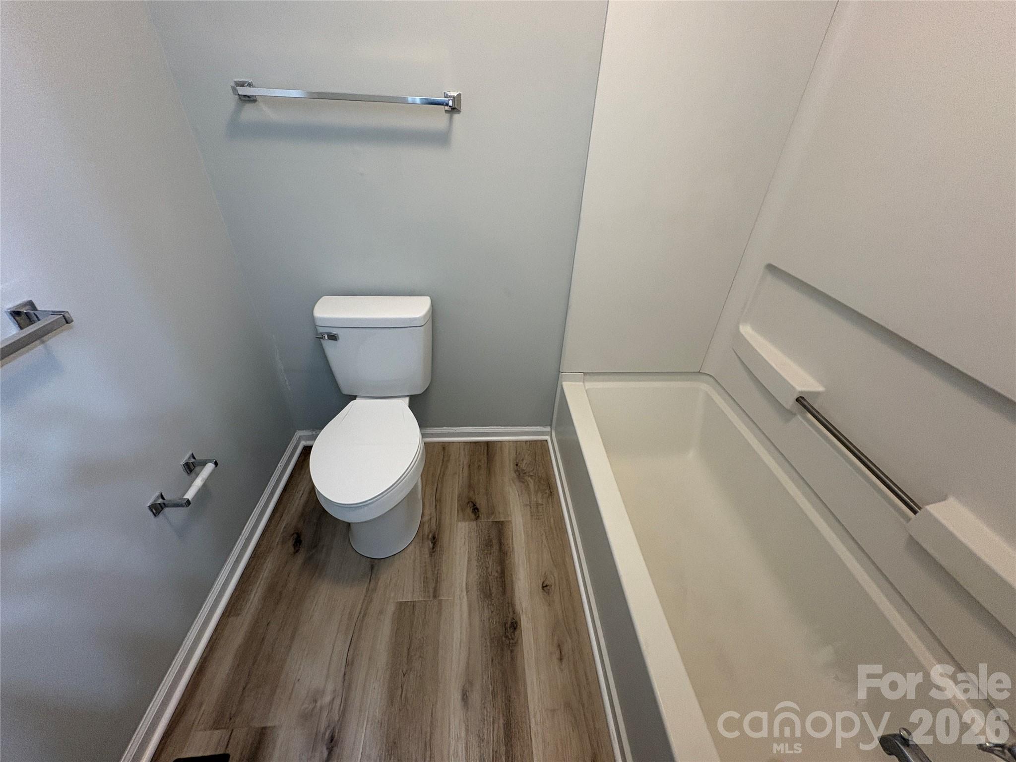 6725 Bevington Ridge Road, Unit A/B Charlotte, NC 28277 - Photo 43 of 48 a bathroom with a toilet and a sink