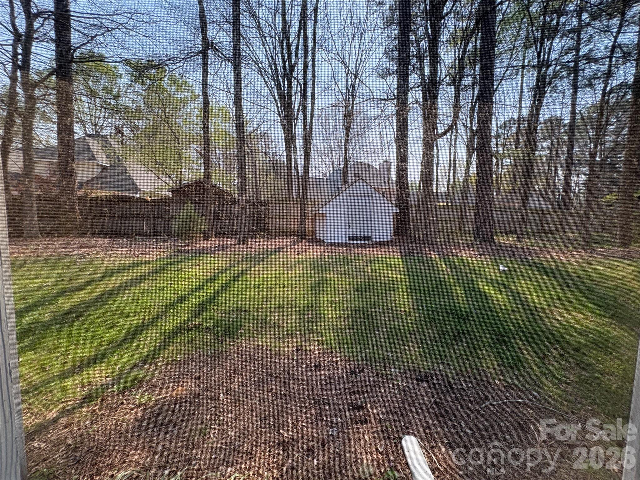 6725 Bevington Ridge Road, Unit A/B Charlotte, NC 28277 - Photo 47 of 48 a view of backyard with tree