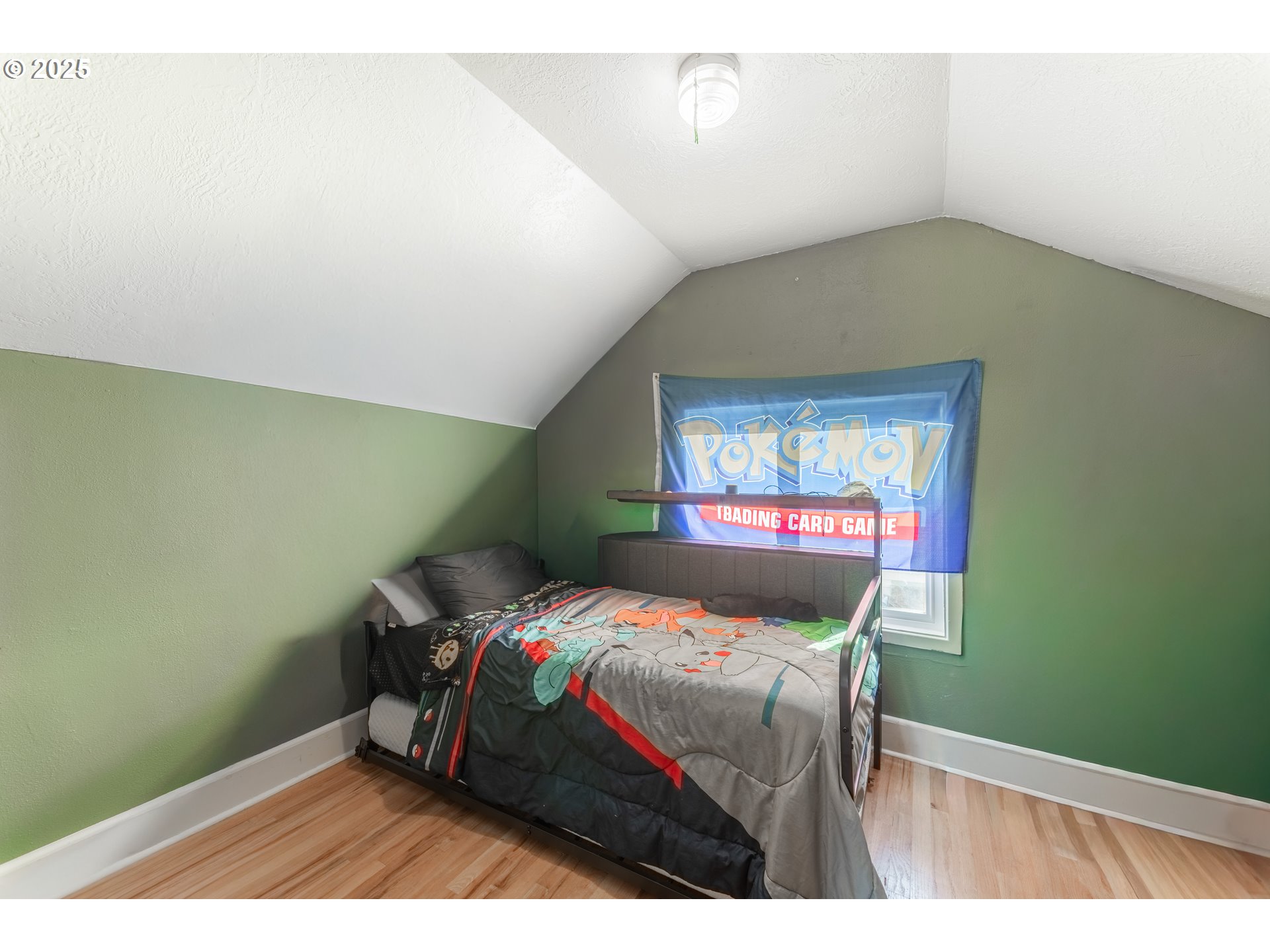 745 16th Street Northeast Salem, OR 97301 - Photo 18 of 32 a bedroom with a bed and window